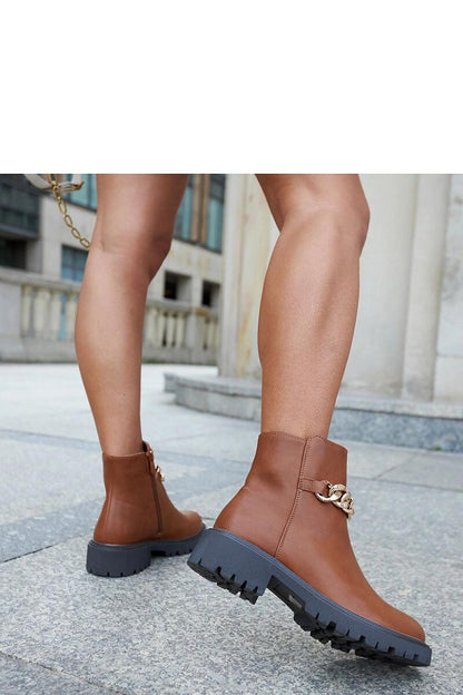 Trendy Brown Vegan Leather Ankle Boots enhanced by Chain Accent from Solea, providing warmth and style for the modern woman this winter.