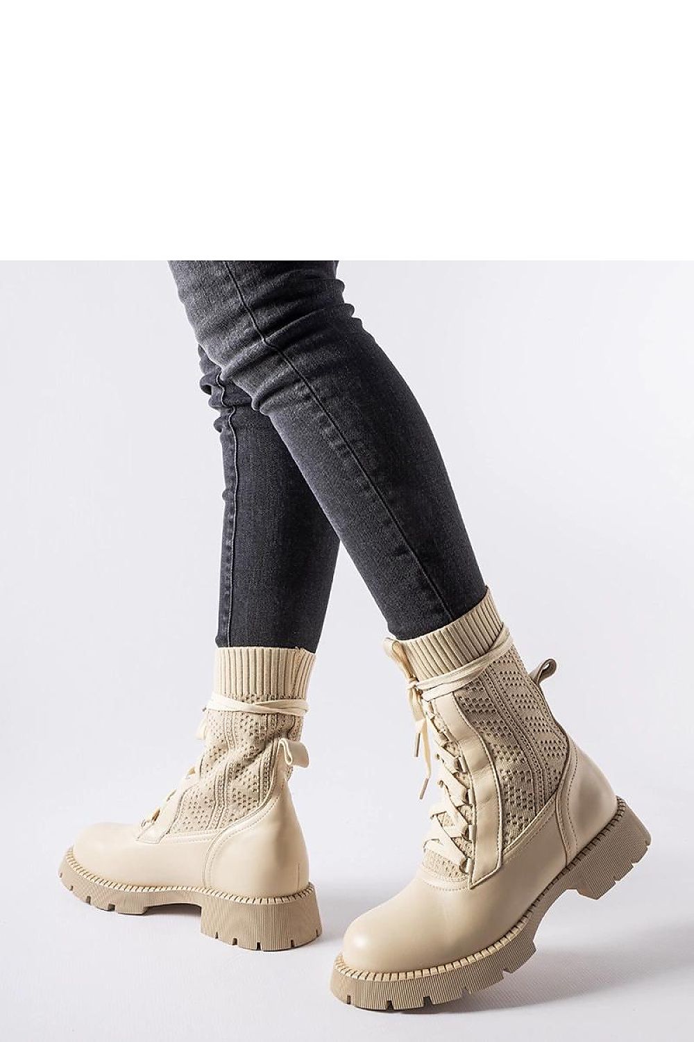 Solea beige lace-up ankle boots displayed elegantly, highlighting the delicate lacy texture and high ankle for warmth, perfect for the fall/winter season.