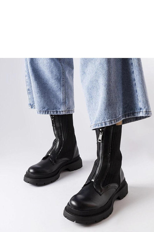 Luxury black sock boots by Solea, Napolitani style for women, featuring a zip closure and comfortable fit, perfect for stylish everyday wear.