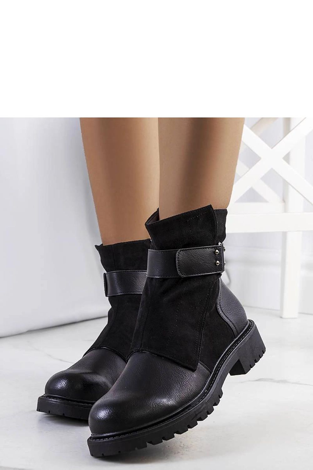 Solea Kevin luxury black ankle boots for women featuring a stylish chunky heel and strap detail, perfect for autumn-winter fashion.