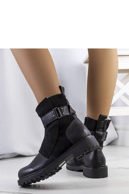 Solea Kevin Luxury Ankle Boots for Women, featuring a stylish black design with a chunky heel and elegant strap, ideal for autumn-winter fashion.