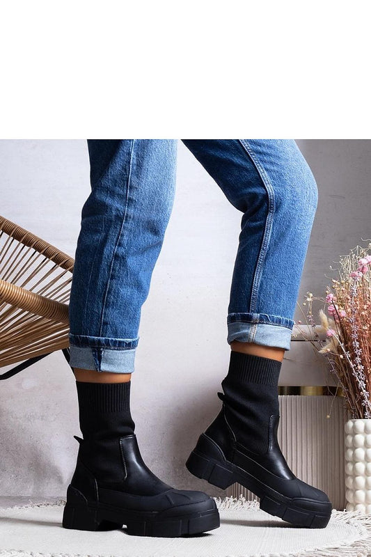 Comfortable and chic Solea ankle boots for women, complete with a slip-on closure, perfect for daily wear.