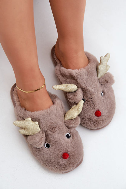 Luxury woman's fur slippers featuring a charming reindeer motif, designed by Step in Style, offering cosy warmth for winter evenings.