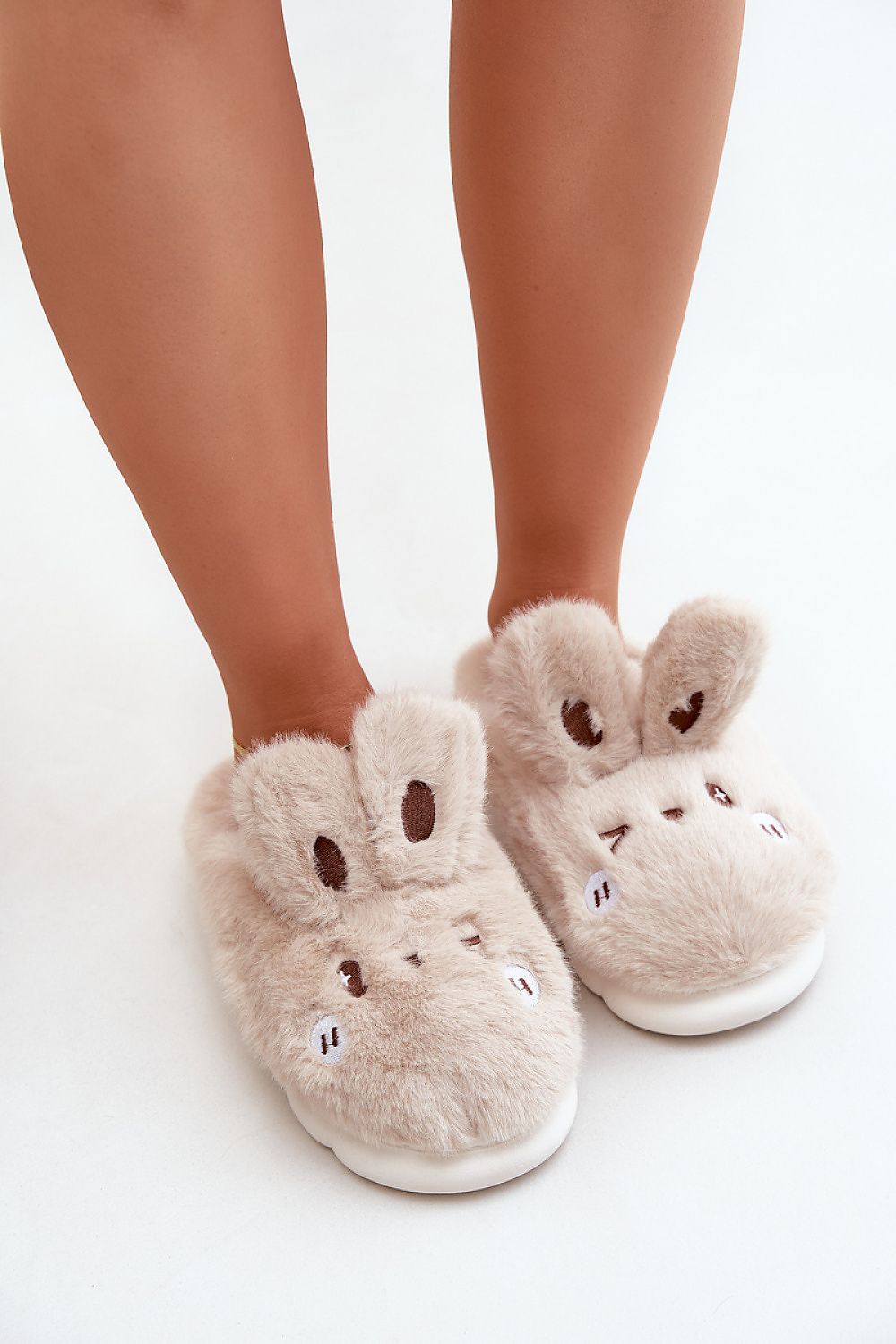 Stylish Women's Furry Bunny Slippers by Step in Style, featuring a charming bunny design and thick sole for enhanced warmth and insulation.