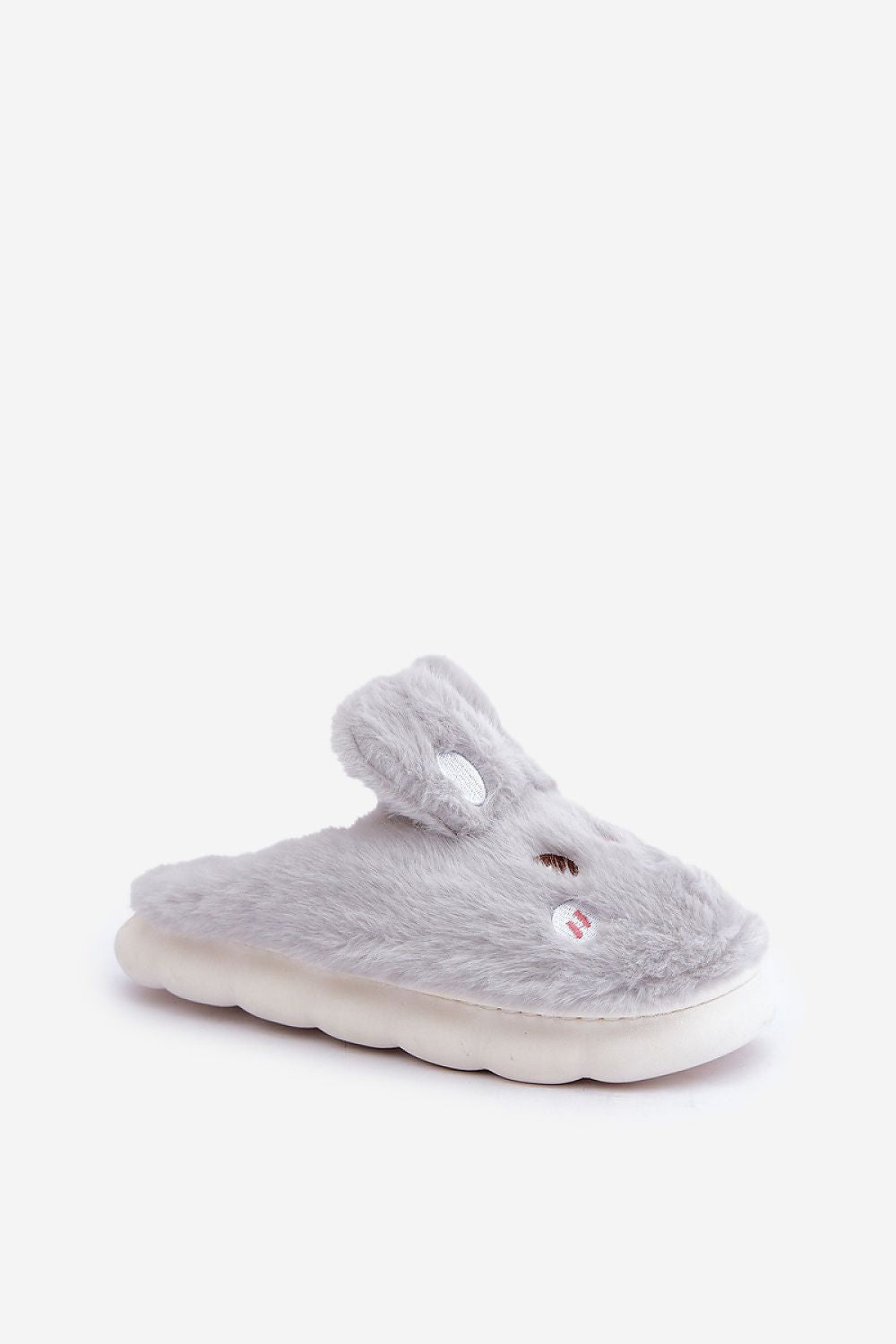 Chic Women's Furry Bunny Slippers by Step in Style, illustrating modern home footwear with a touch of whimsy and superior warmth for daily wear.
