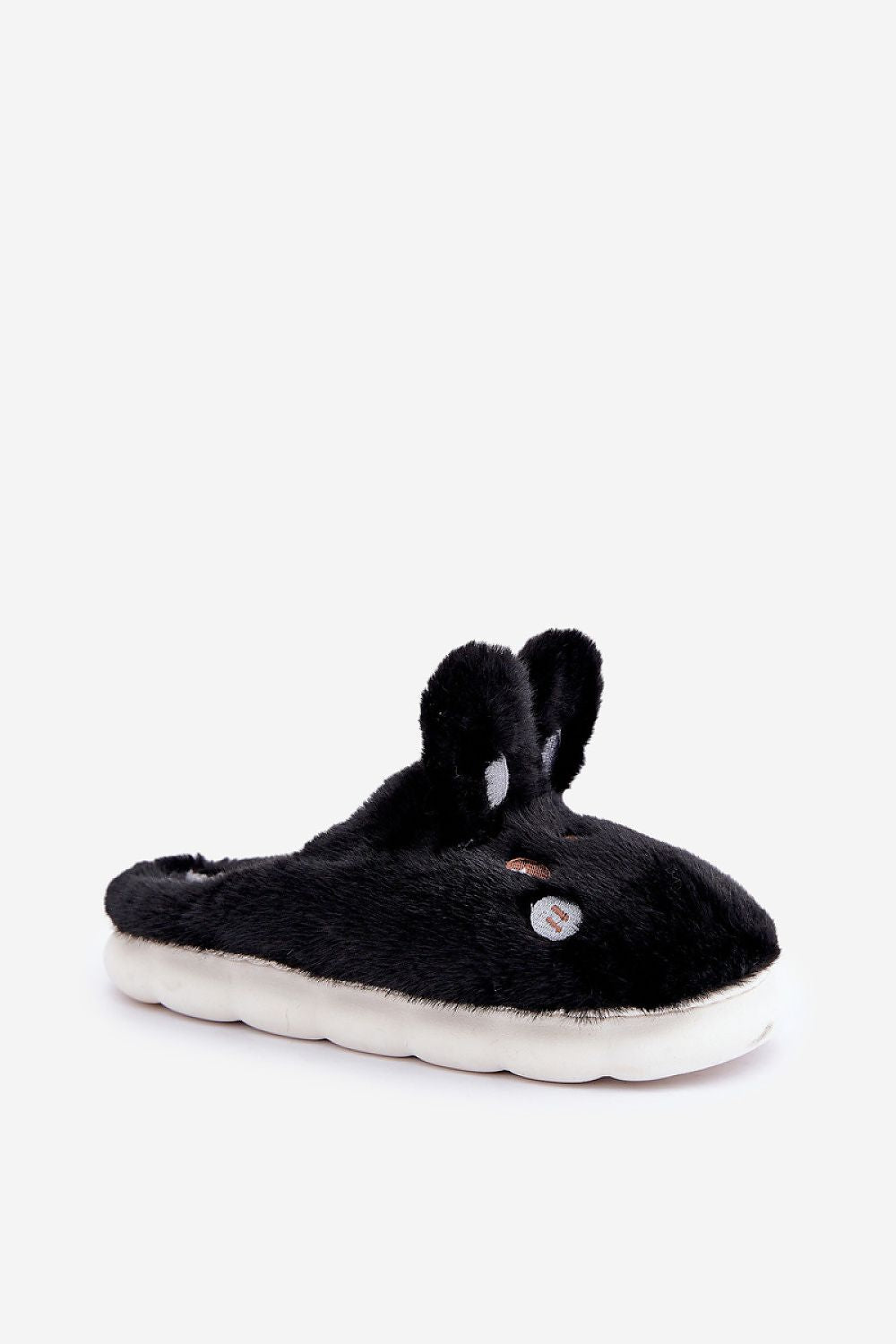 Soft and warm women's bunny slippers featuring a durable sole, exquisitely crafted by Step in Style for ultimate comfort.