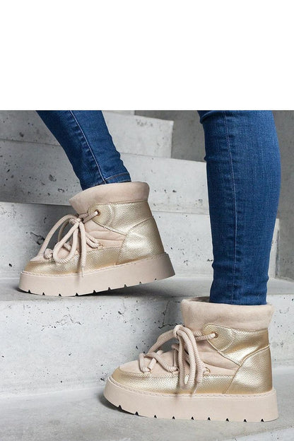 Solea Beige Snow Boots showcasing a luxurious fur lining, ideal for cold weather elegance.