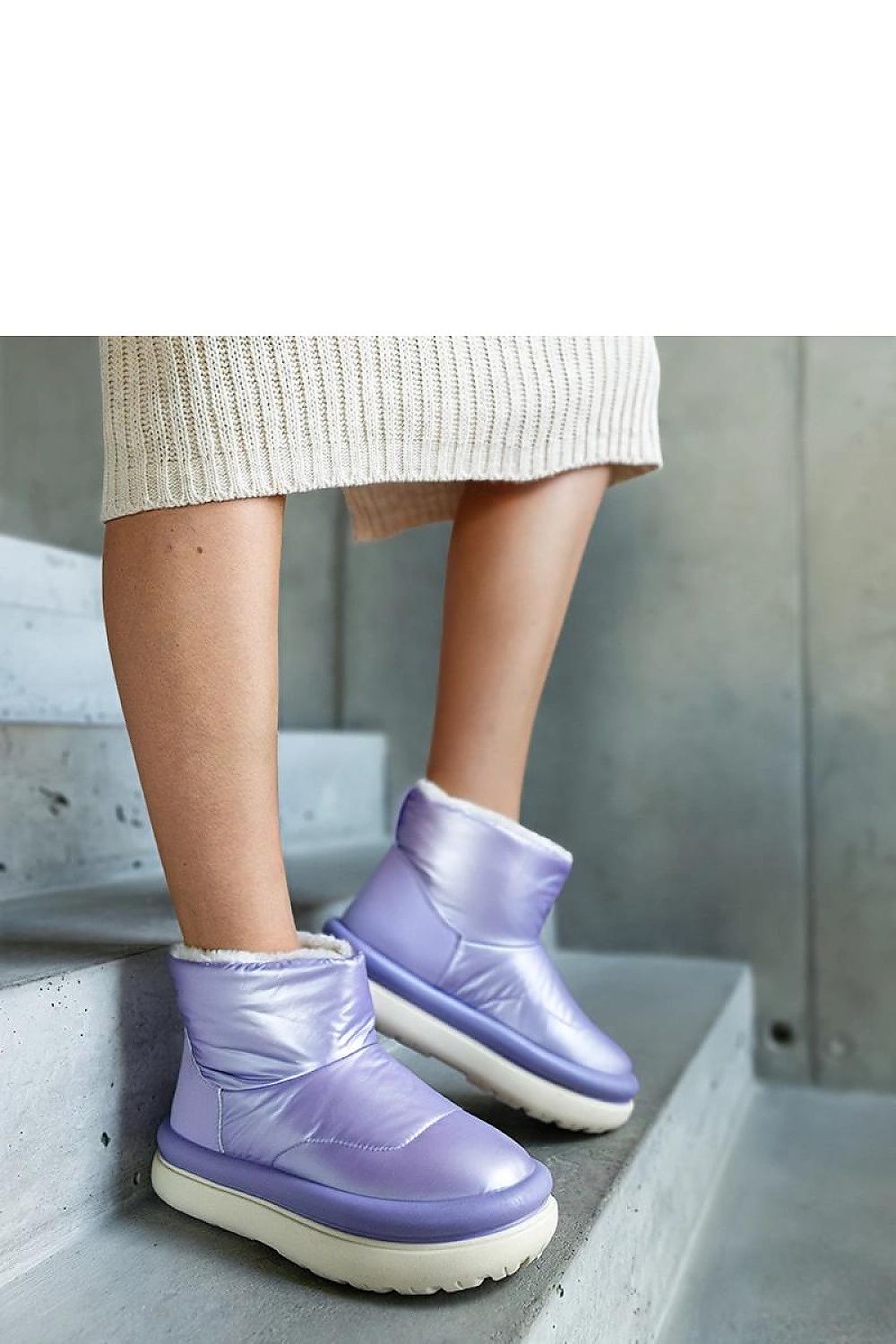 Solea luxurious purple snow boots featuring insulation, medium heel, and slip-on closure, ideal for cold weather fashion.