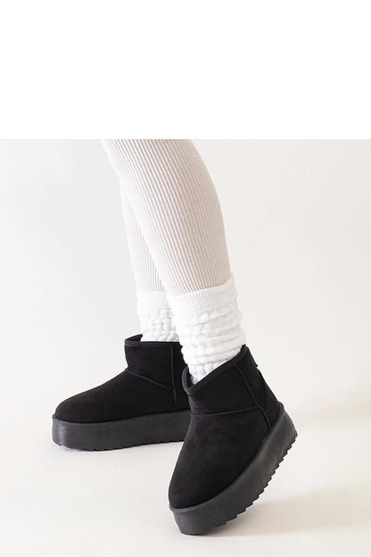 Solea Women's Black High Platform Snow Boots resting elegantly on a white background, showcasing their stylish and insulated design for winter.