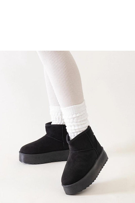 Solea Women's Black High Platform Snow Boots resting elegantly on a white background, showcasing their stylish and insulated design for winter.