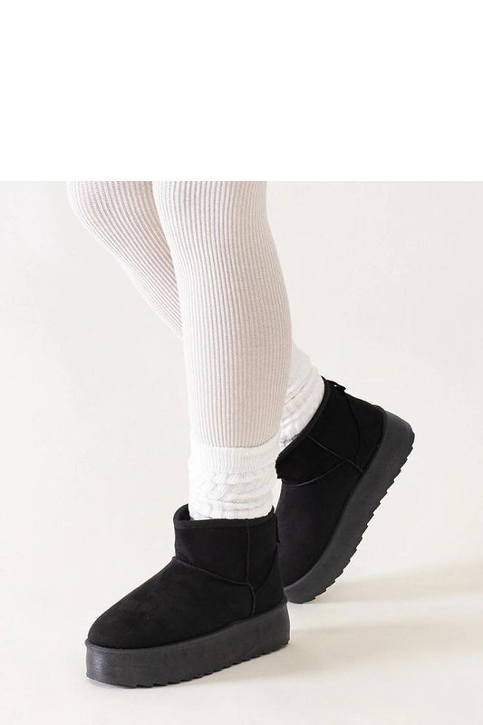 Close-up view of Solea Women's Black High Platform Snow Boots, highlighting the premium eco leather fabric that ensures warmth and comfort.