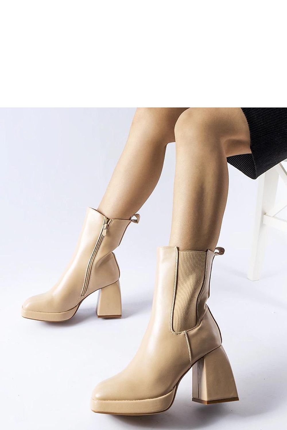 Beige insulated heel boots by Solea showcasing eco leather material and elegant zipper fastening, perfect for winter fashion with a modern square toe design.