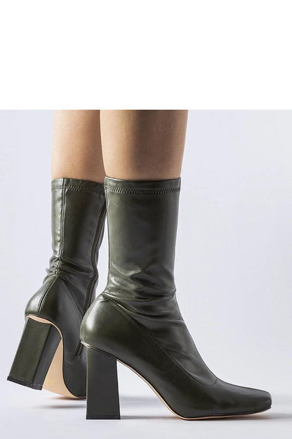 Close-up view of the elegant green Upland stiletto boots by Solea, highlighting the premium organic leather and sophisticated zipper.
