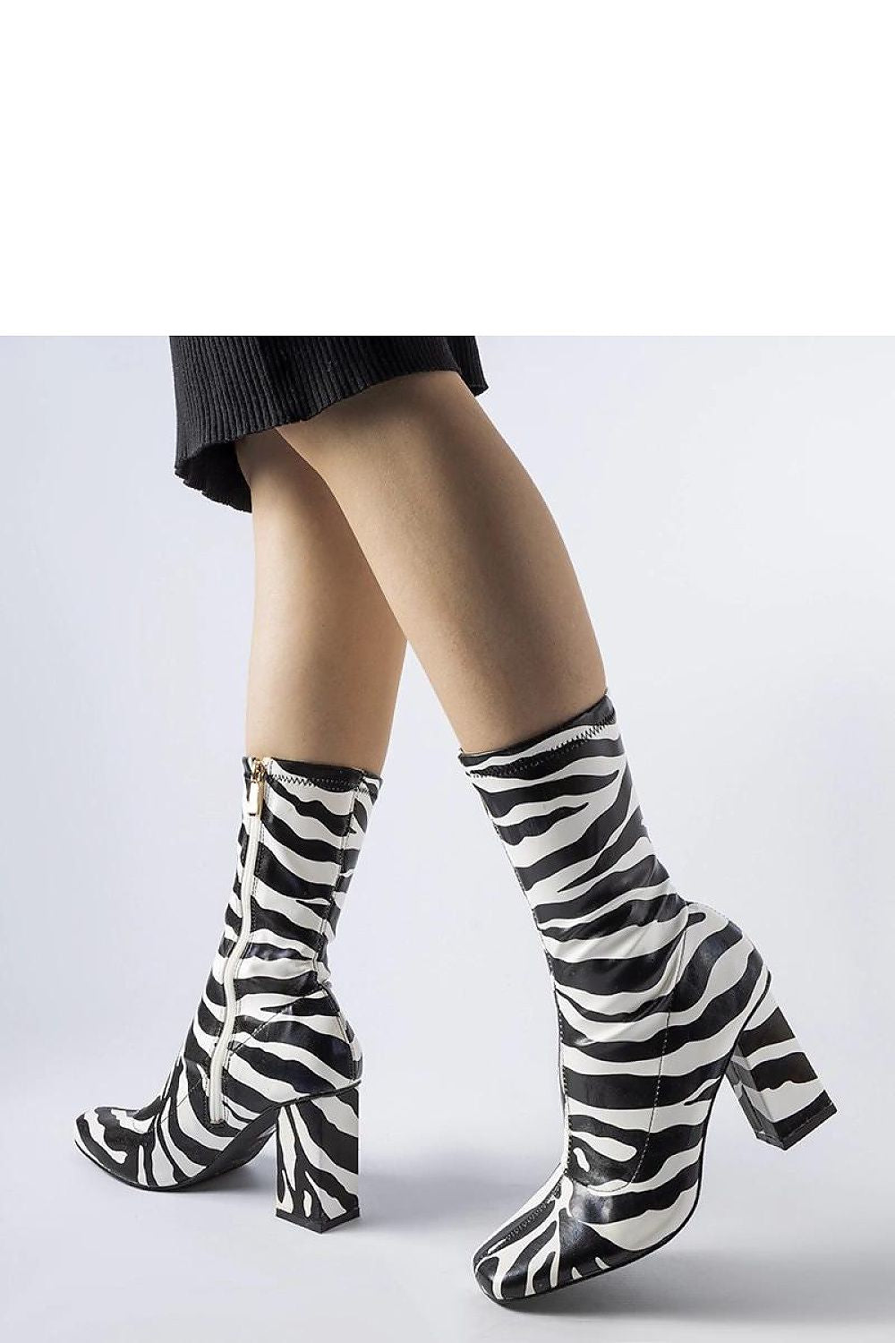 Elegant green Upland stiletto boots for women by Solea, crafted from organic leather with a stylish zipper detail, showcasing luxury and comfort for autumn-winter fashion.