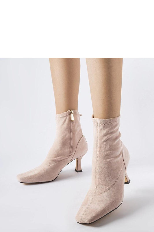 Elegant pink Lucerne low-heeled boots by Solea made of eco leather, showcasing a modern square toe design, ideal for stylish comfort in cooler weather.