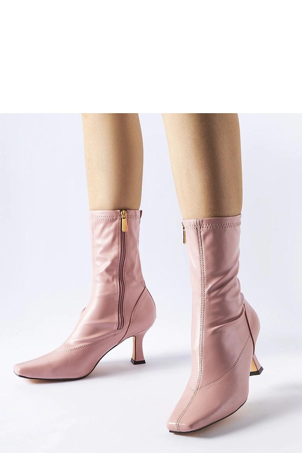 Solea Pink Luisella ankle boots made from eco leather, featuring low heels and a chic design, perfect for winter styling.
