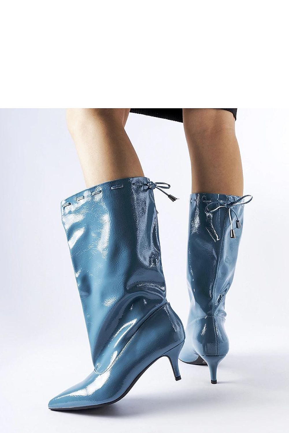 Chic blue Clinton low stiletto boots from Solea, designed for comfort and style in eco leather, suitable for cold weather.