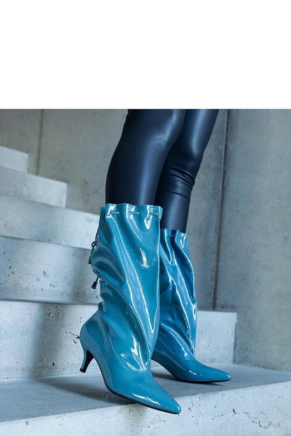 Stylish Solea Clinton low stiletto boots in blue eco leather, showcasing their warm interior and sophisticated slip-on design for comfort.