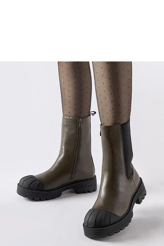 Luxurious Dark Green Eco Leather Trapper Boots for women by Solea, featuring insulated lining and zipper closure for comfort and chic style.