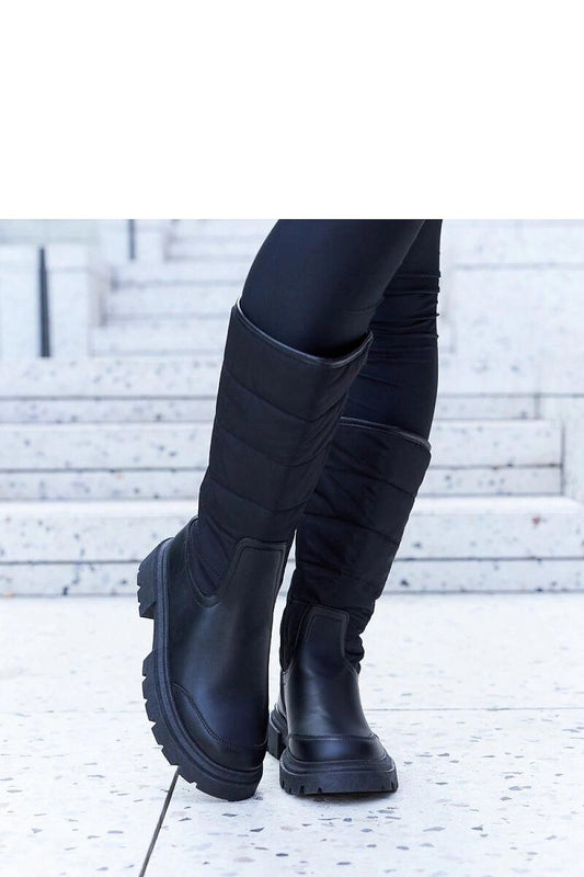 Solea Villafranca Black Insulated Thigh-High Snow Boots showcasing minimalist design and luxurious style, perfect for winter wear.