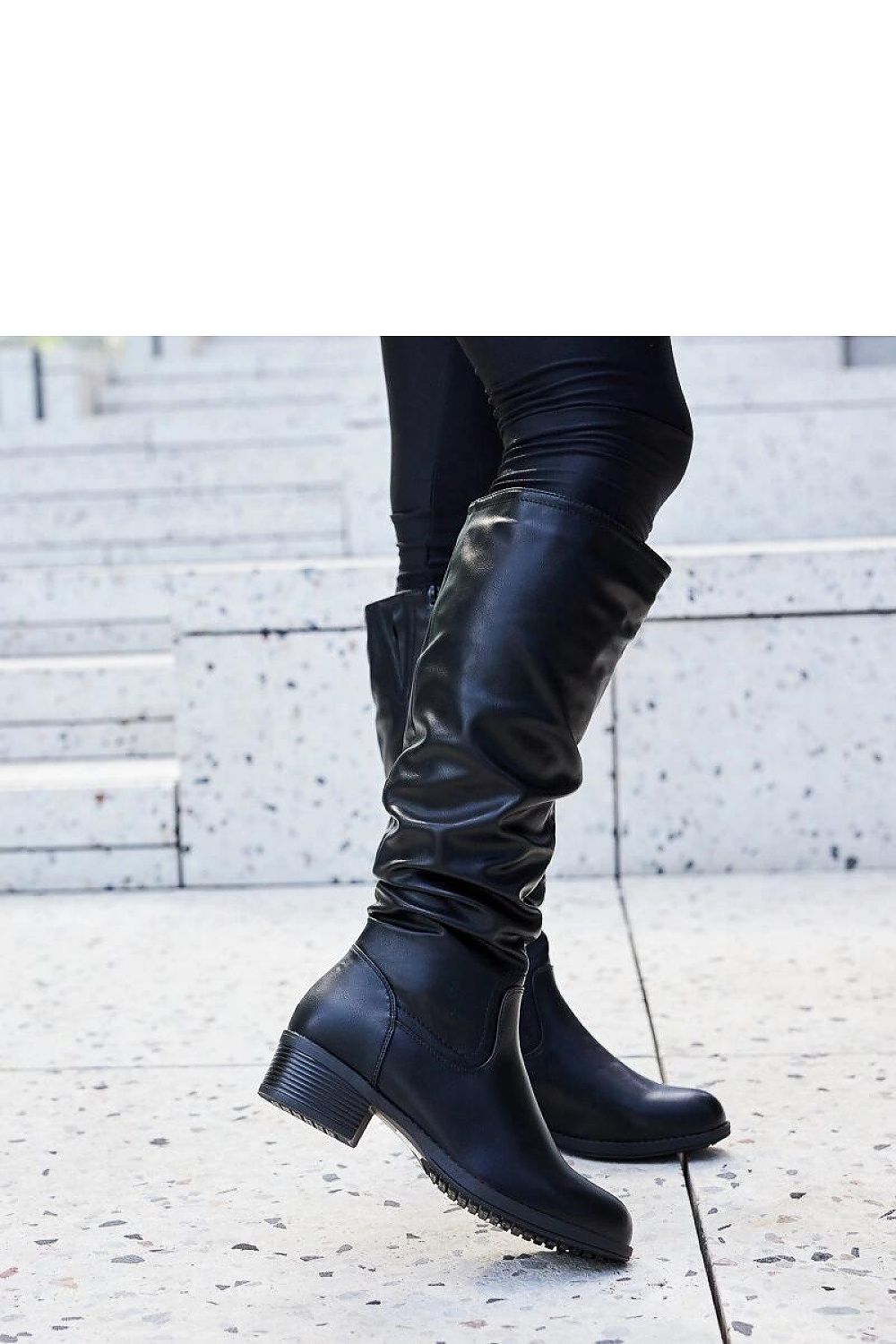 Elegant black thigh-high boots for women from Solea, crafted in weatherproof eco leather, designed for chic winter style and comfort.