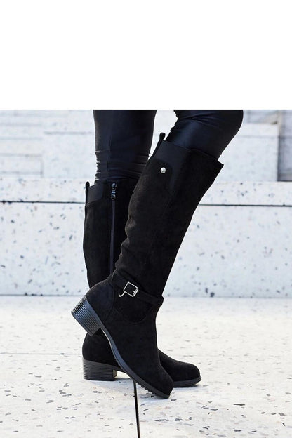 Side view of luxury black eco-suede women’s knee-high boots from Solea, featuring chic almond-shaped toes and practical side zippers for easy wear.