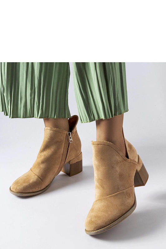 Close-up of Solea Beige Heel Boots for Women, highlighting high-quality craftsmanship and unique design elements, ideal for fashionable women seeking sophistication.