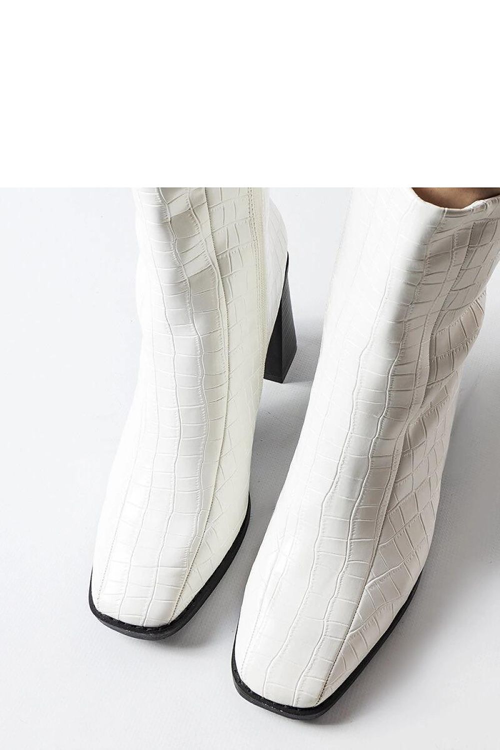 Elegant Solea ankle boots crafted from eco-friendly imitation crocodile leather, showcasing a chic design and a stable stiletto heel for ultimate style.