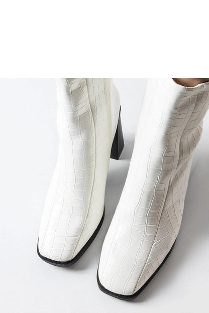 Elegant Solea ankle boots crafted from eco-friendly imitation crocodile leather, showcasing a chic design and a stable stiletto heel for ultimate style.