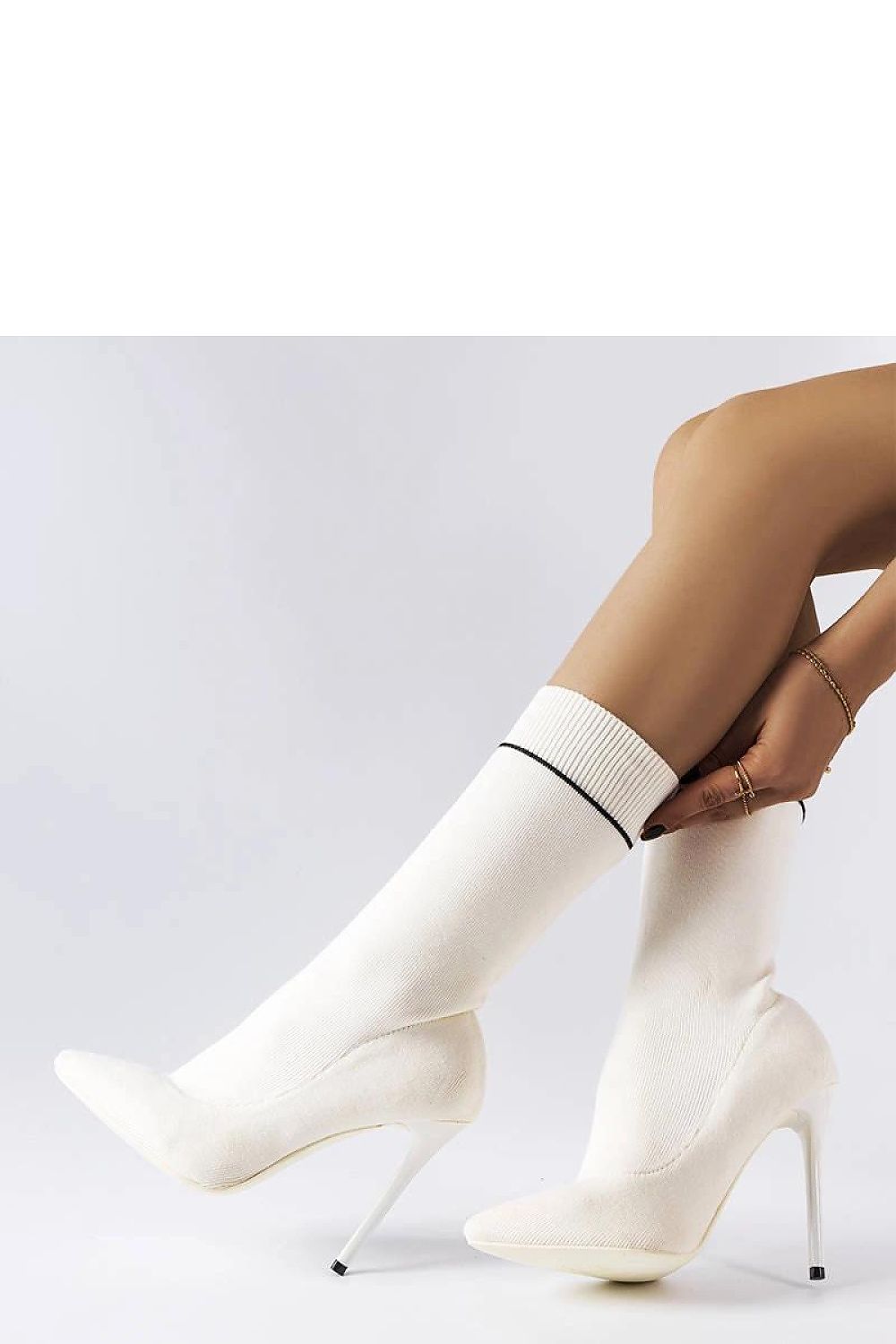 Elegant Solea Stiletto Boots for Women, featuring a chic slip-on design with a high 10 cm heel, perfect for adding a touch of luxury to your outfit.