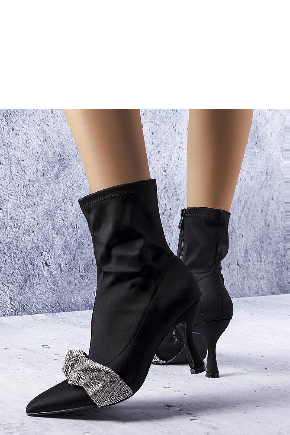 Stylish Solea Caisse ankle boots with an 8 cm stiletto heel, perfect for adding a touch of luxury to any outfit, available in sizes EU 36 to 41.
