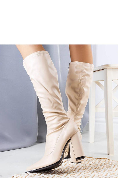 Chic beige Velass stiletto boots for women with a sophisticated silhouette and zipper closure, designed for comfort and elegance by Solea.