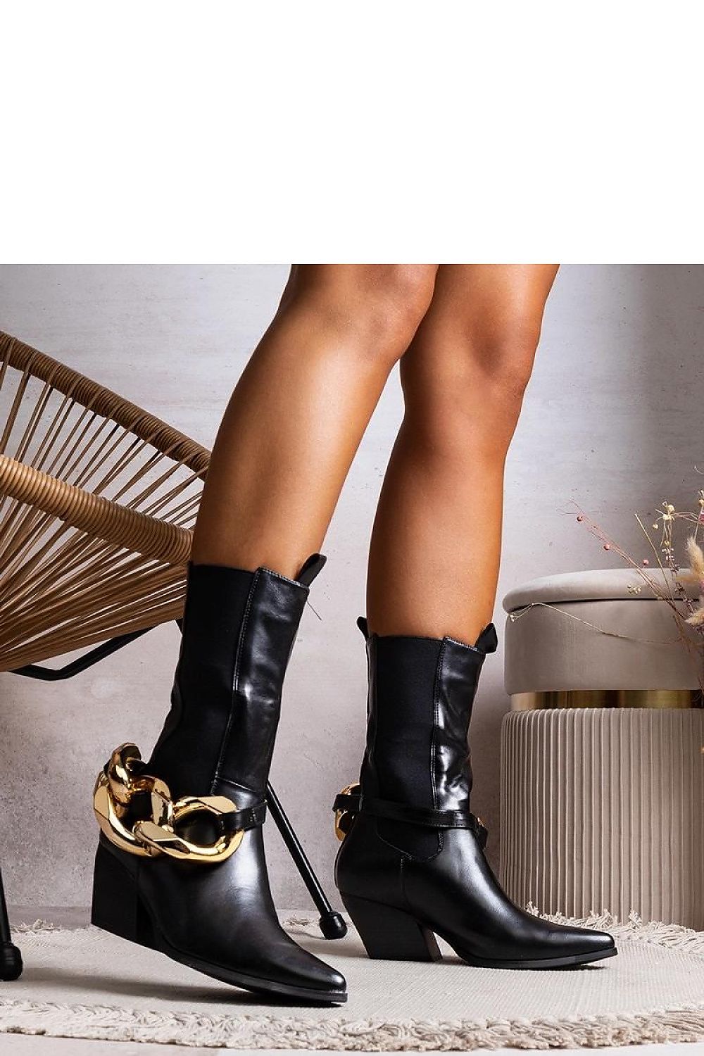 Fashionable display of Solea Black Nash Chained Cowboy Boots showcasing the chic chain detail and perfect fit for trendy women.
