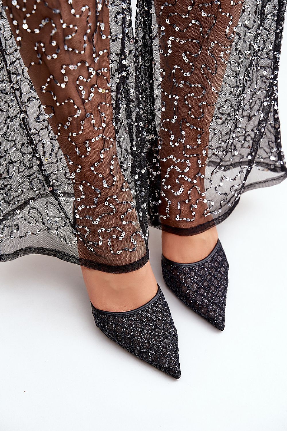 Chic and sophisticated women's high heels by Step in Style, perfect for evening events and celebrations with stunning sequined embellishments.