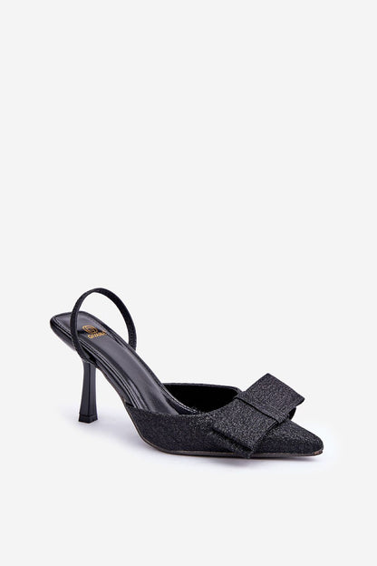 Close-up of Step in Style brocade high heels showcasing the detailed fabric and elegant bow design, ideal for fashionable women looking to add a touch of luxury to their evening wear.