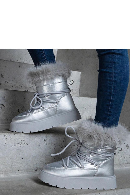 Luxury silver lined snow boots by Solea, featuring plush fur lining and high platform design, perfect for stylish winter fashion and comfort.