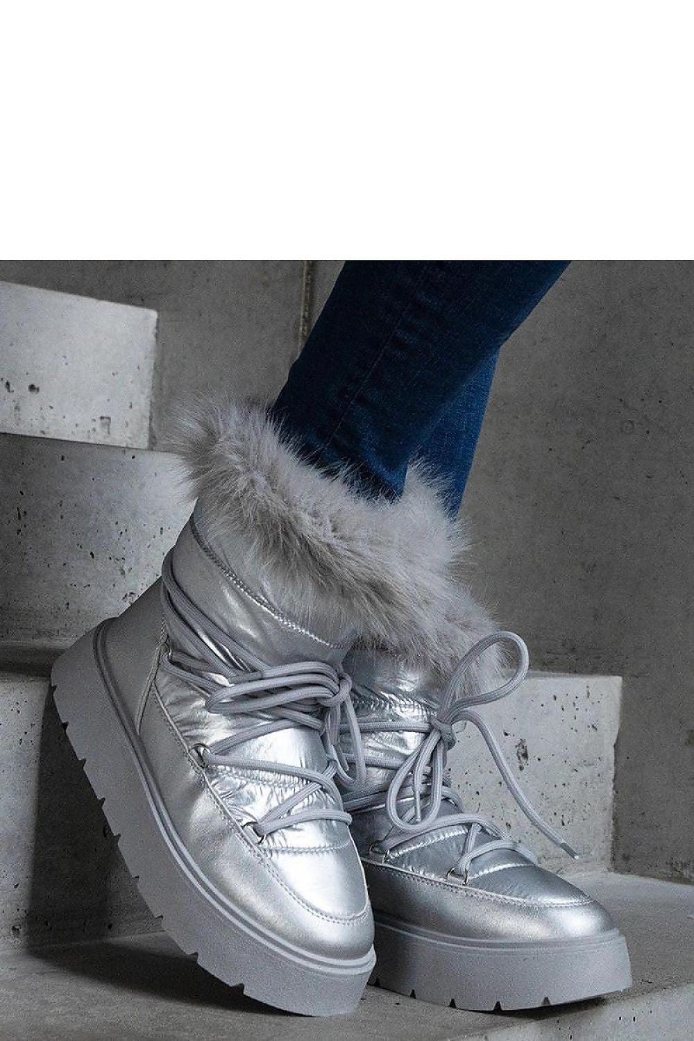 Luxury silver lined fur snow boots by Solea featuring high platform design, perfect for winter elegance.