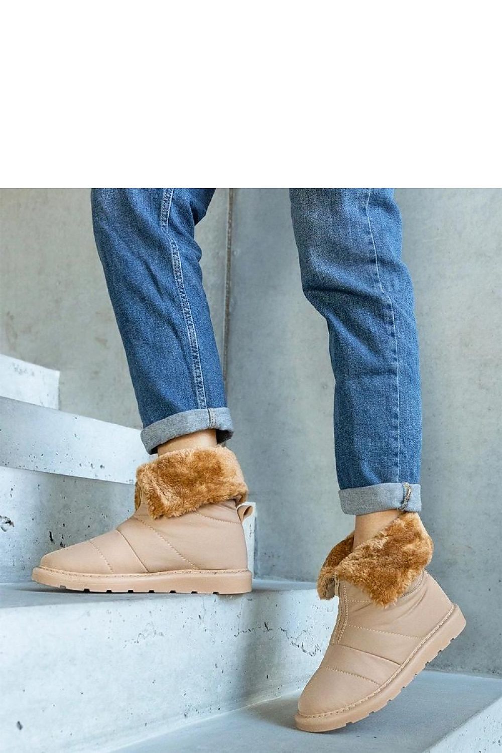 Solea Insulated Snow Boots displayed elegantly, highlighting their round toe and zipper closure in a chic beige hue, perfect for cold weather.