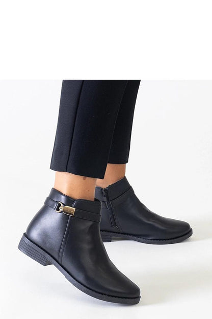 Elegant Black Eco-Leather Ankle Boots With Gold Inserts by Solea, showcasing a stylish design perfect for winter attire.