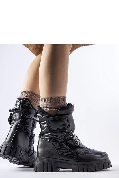 Solea Women's Black Snow Boots in action, perfect for everyday elegance and durability in winter conditions.