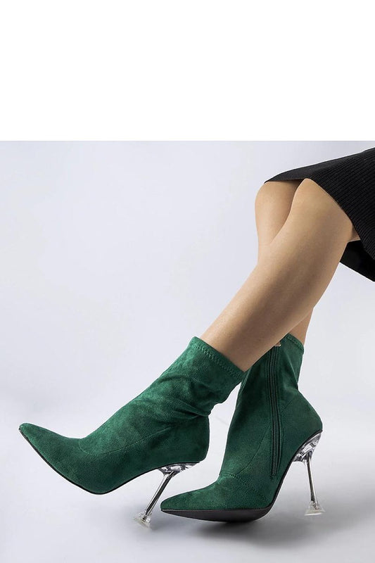 Chic Solea Green Ankle Boots featuring a striking 11.5 cm Decorative Heel, perfect for enhancing winter outfits with a touch of luxury.