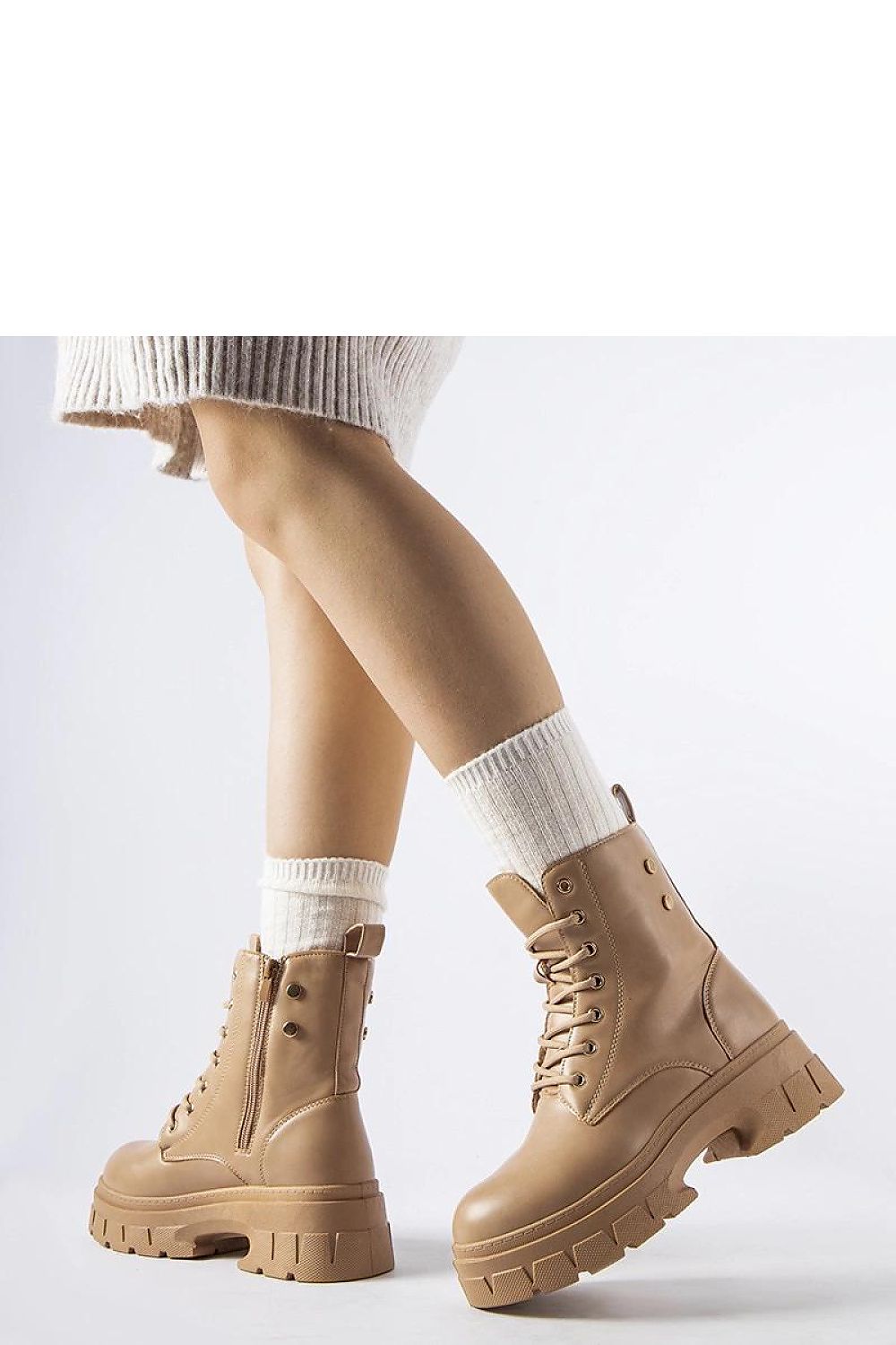 Fashion-forward beige Melicucca ankle boots by Solea, showcasing durability and style in vegan leather with a comfortable 5cm heel.