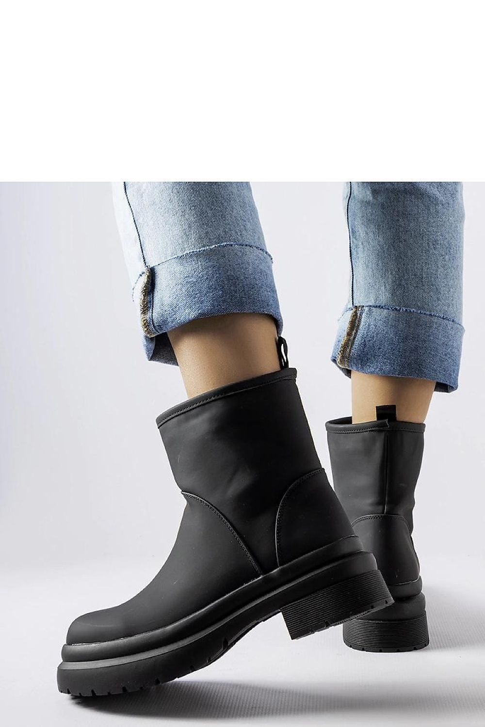 Sophisticated Solea Clotilde Black Insulated Rubber Ankle Boots with round toe design, combining style and functionality for cold weather elegance.