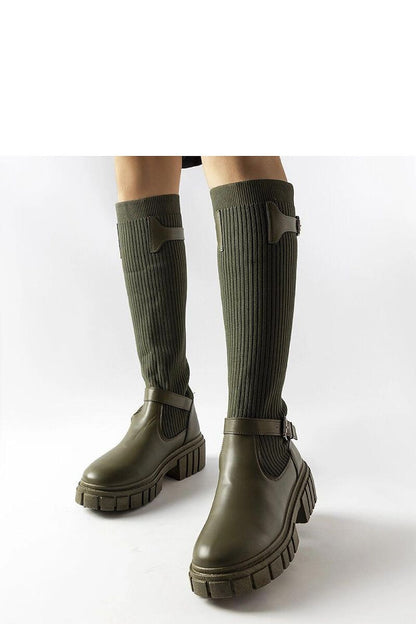 Elegant Solea Green Thigh-High Boots with 5cm Heel, showcasing a luxurious rubber design, perfect for stylish winter wear.