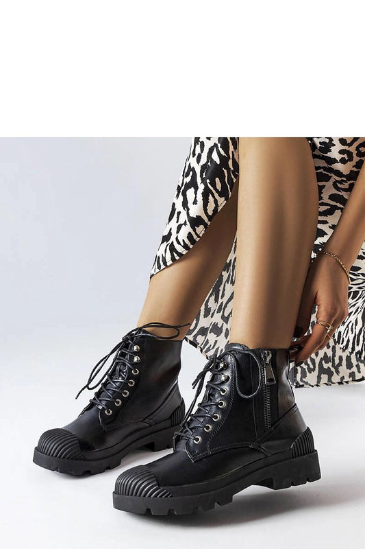 Elegant Solea Black Eco-Leather Women's Work Boots, designed for comfort and convenience, showcasing a chic rubber toe detail.