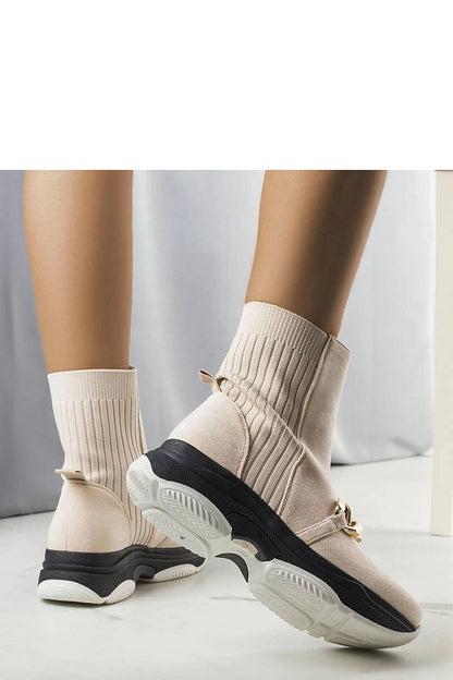 Elegant Solea faux suede Ulster boots in beige with chain detail, designed for comfort and warmth during cold weather.