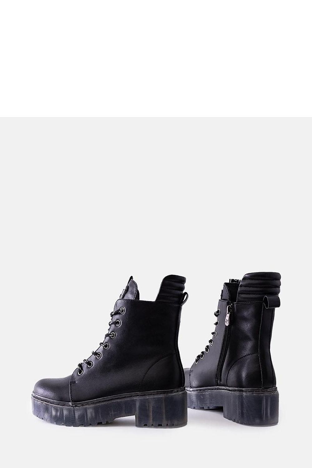 Stylishly presented Solea Charlton Ankle Boots, illustrating their luxurious design and comfortable insulated features, ideal for cold weather.