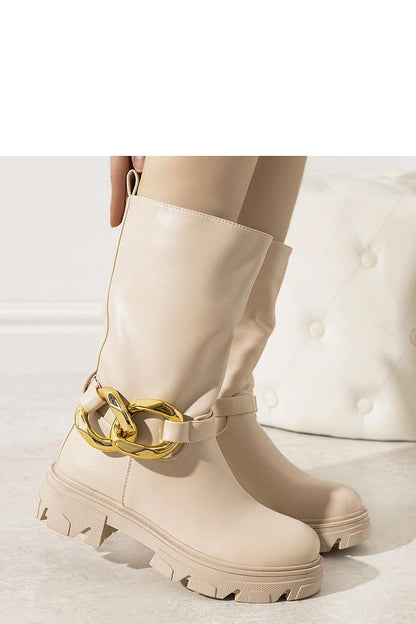 Close-up of Solea Harrison Ankle Boots, highlighting the elegant decorative gold chains and high trekking sole for unparalleled comfort.