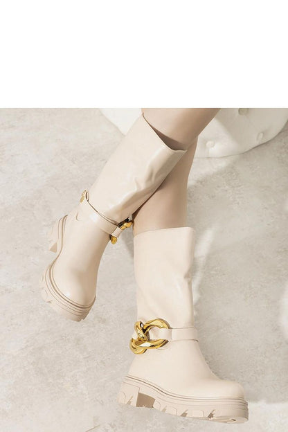 Solea Harrison Ankle Boots in a trendy outfit showcasing the warm fur interior, perfect for cold weather and stylish comfort.