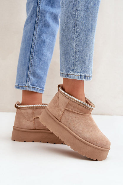 Step in style's Luxury Women's Snow Boots, designed with eco suede and fur lining, showcasing a chic platform suited for cold weather.